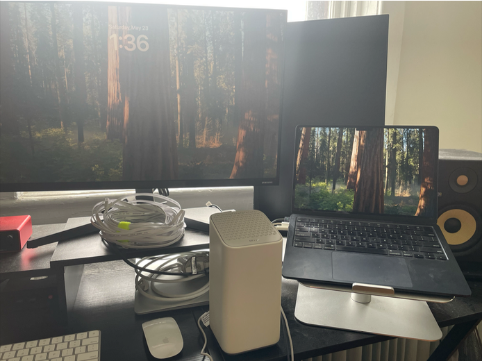 MacBook connected to an old router for an isolated router security assessment
